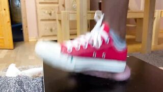 Ball crush with red Converse Chucks