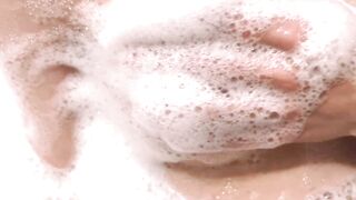 Playing with my tits in foam, bitch relaxing in bath