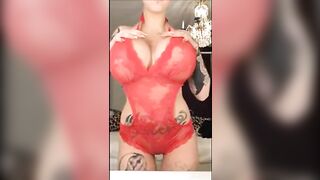 Tiny Swedish girl with huge tits stripping