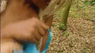 Naughty blonde makes video in the bush, masturbating!
