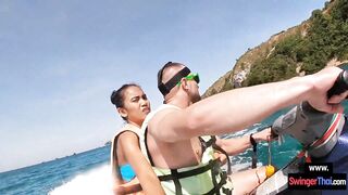 Amateur Thai girlfriend gives him a blowjob in public