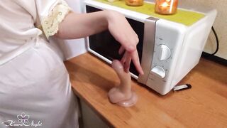 Naughty Beauty Fucks Pussy Dildo till Orgasm in the Kitchen