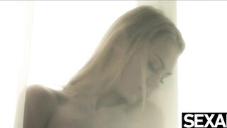 Sexy blonde plays with her big natural tits as she masturbates