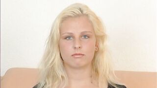 She is blond and has big breasts