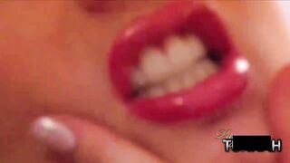 BBW babe with big juicy red lip is teasing you with a mirror in this fetish lips video