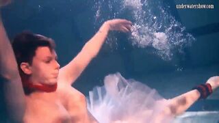 Bulava Lozhkova with a red tie and skirt underwater