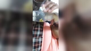 Black woman pumps a big tit for Youtube