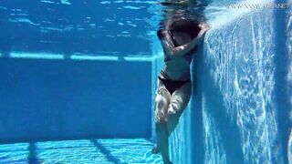 Big tits Sheril goes underwater naked