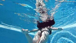 Big tits Sheril goes underwater naked
