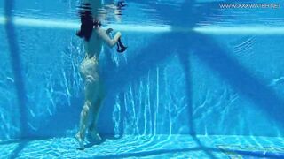 Big tits Sheril goes underwater naked