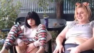 Two girls playing in public