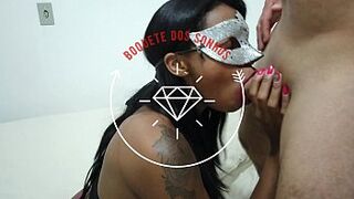 Beautiful, black woman giving a blow job.