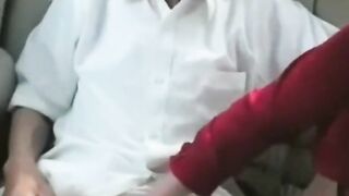 Asian older couple in the car