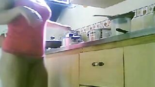 LATINA MATURE NUDE KITCHEN