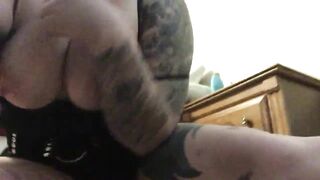 Horny Tattoo Slut Wearing Black Dress Plays with herself