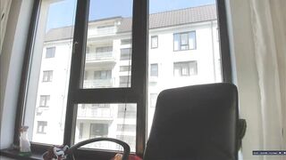 In front of the window