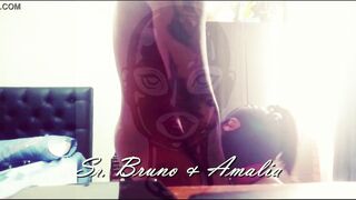 Submissive Amalia sucking with a latex mask