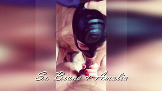Submissive Amalia sucking with a latex mask