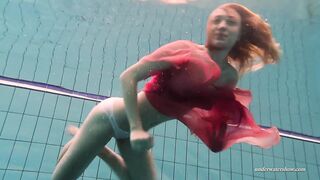 Swimming beauty totally naked and lonely in the pool