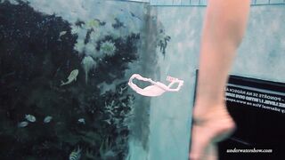 Swimming beauty totally naked and lonely in the pool