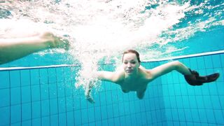 Russian babes swim all together and get each other naked