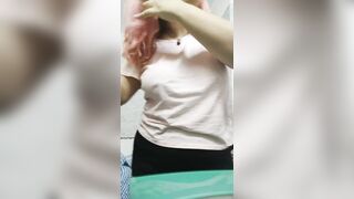 Pink hair, big boobs and ass getting ready for work
