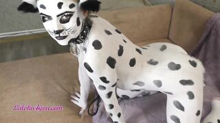 Beautiful Girl In Dalmatian Costume Playfully Rides Cavalier