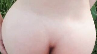 Pregnant blonde gets cum on her belly in a field