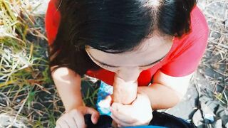 Risky passionate blowjob in nature outdoors.