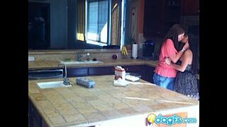 Horny milf eats teen pussy in the kitchen