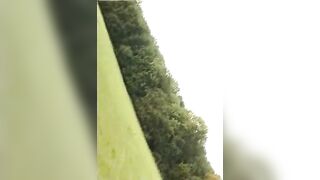 Uncle rides with hitchhiker in the forest