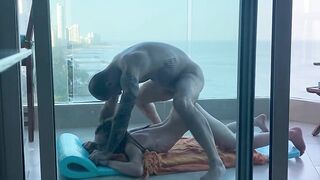 On a balcony in Cartagena, a young student gets her pretty little ass filled!