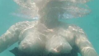 Big tits in the water