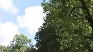 farmer girl makes picnic in the forest