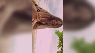 Alexandra Stan and the beach
