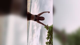 Alexandra Stan and the beach