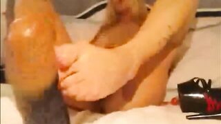 Girl masturbates using high heels