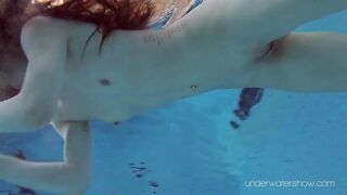 Roxalana Cheh sexy redhead underwater