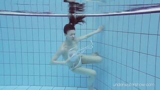 Roxalana Cheh sexy redhead underwater