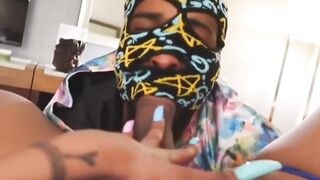 Masked guy with a fancy mask sucking the cock of a Black TS