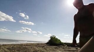Blonde slut sucks old guys dick on the beach in Florida