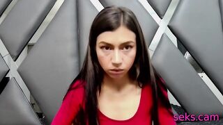 slim brunette with long legs shows her shaved pussy