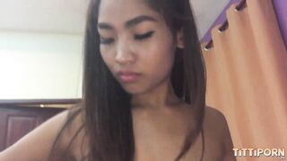 Stunning big tit Thai teen rides a stiff cock