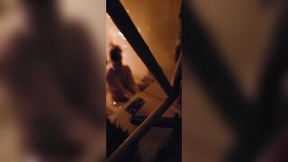 Peeping through my neighbours bathroom window,watch how she plays with her pussy