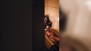 Peeping through my neighbours bathroom window,watch how she plays with her pussy