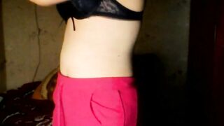 Hacked laptop camera. Girl puts on a bra