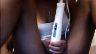 Vibrator on ebony pussy
