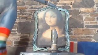 Sexy chick with body ink riding huge dildo