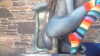 Sexy chick with body ink riding huge dildo