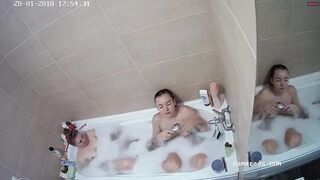 Two lesbian girls bathing